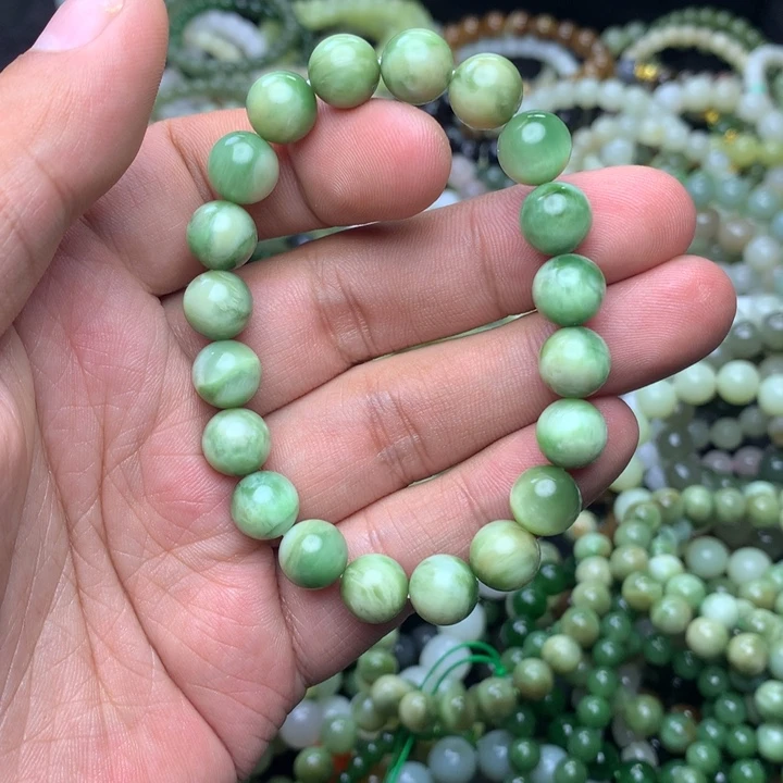 T***s和田玉未镶嵌手串黑羊洞碧玉