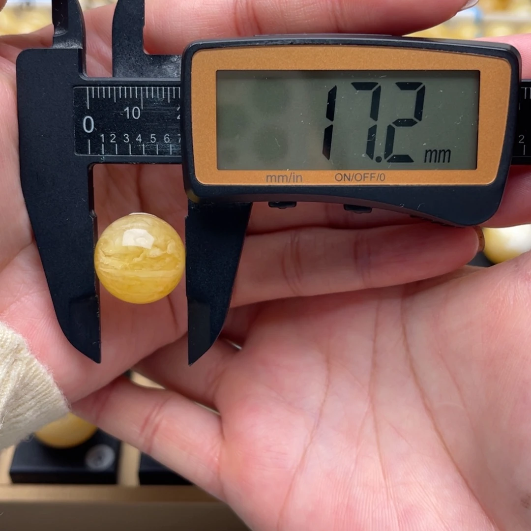 琥珀未镶嵌裸石蜜蜡圆珠笑