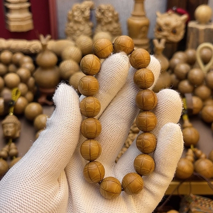 尛***球木质非金属六道木手串1.2