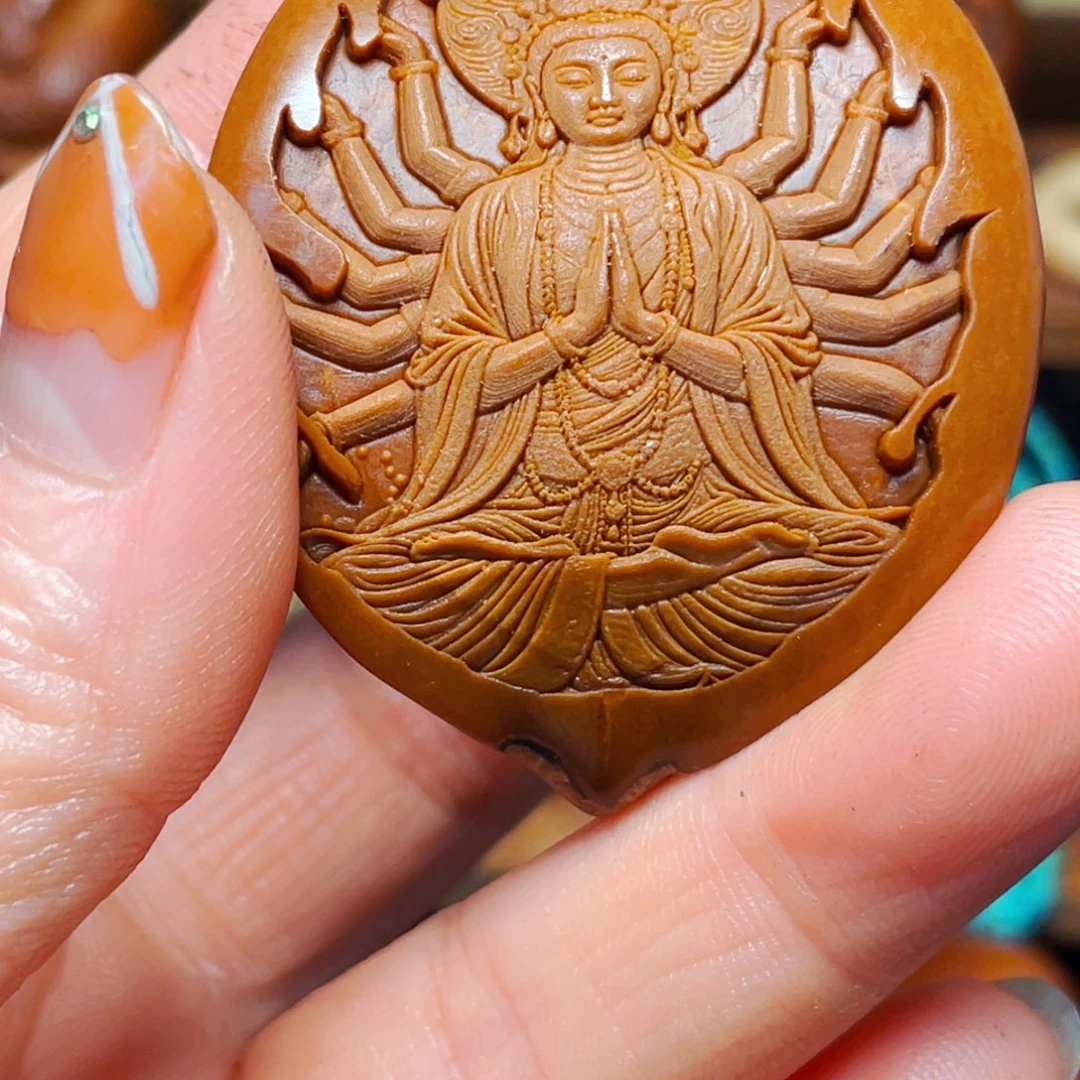 橄榄核把件三花核千手观音单颗