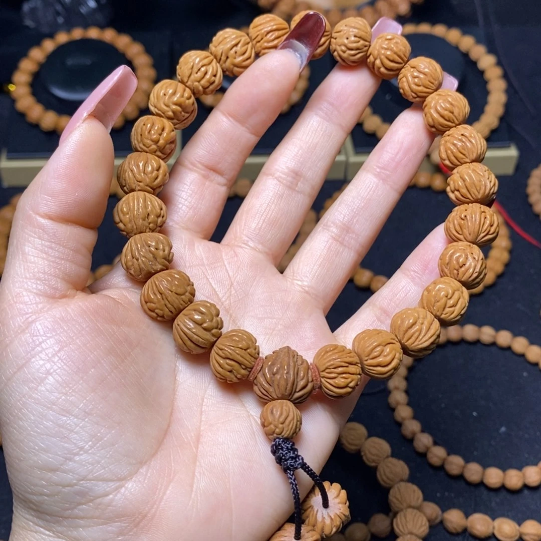 李***全桃核吊坠秦岭文玩