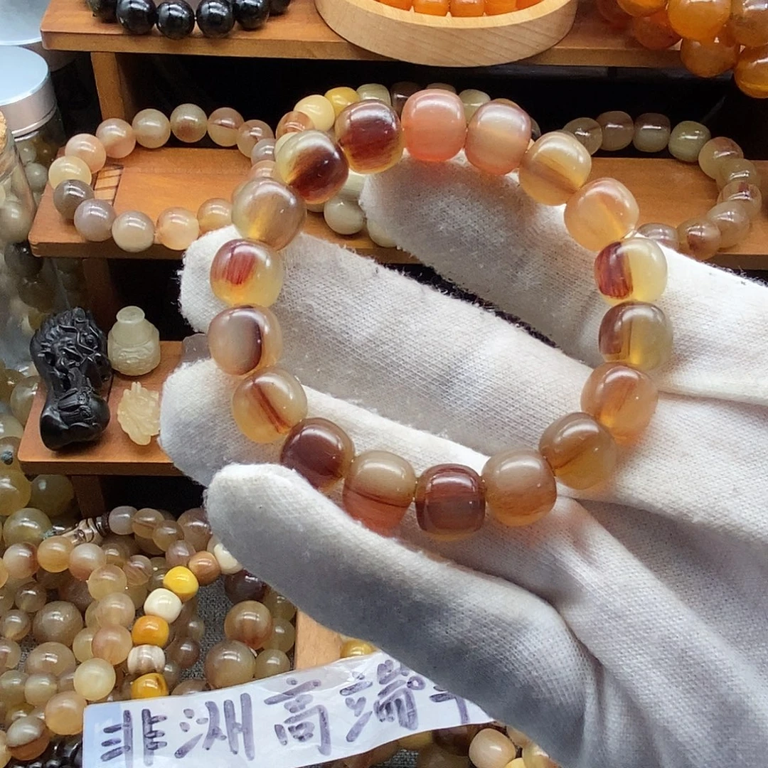 a***？布艺非金属12mm精品非洲黑斑手串