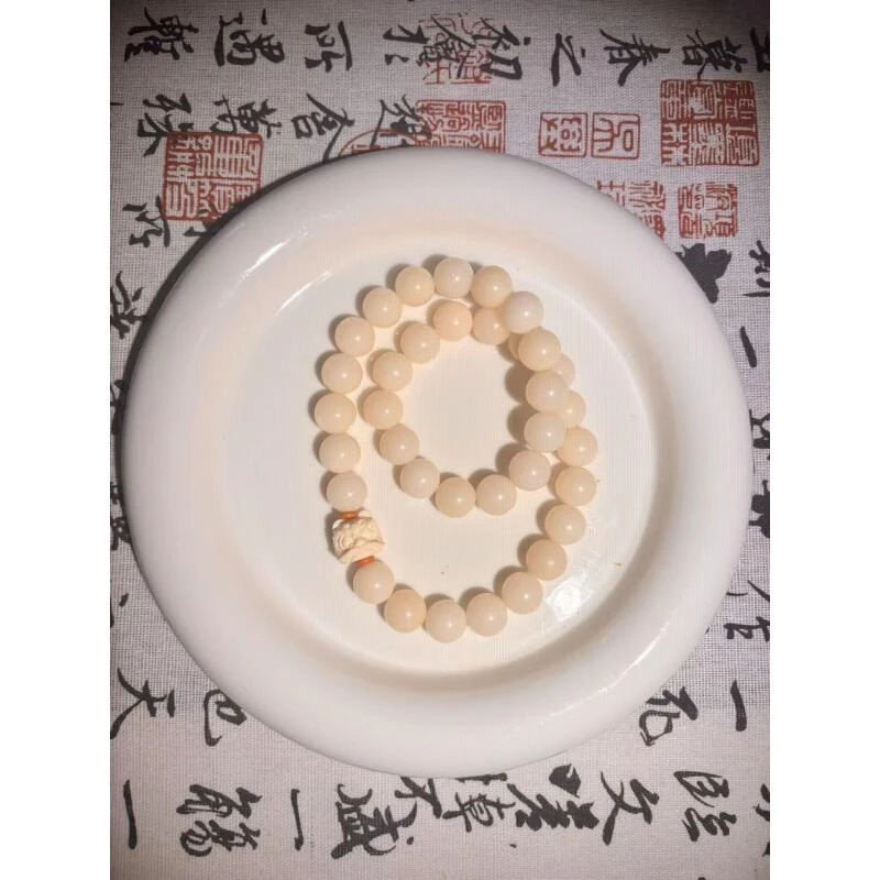 PT2990 白玉菩提1.2带醒狮双圈手串