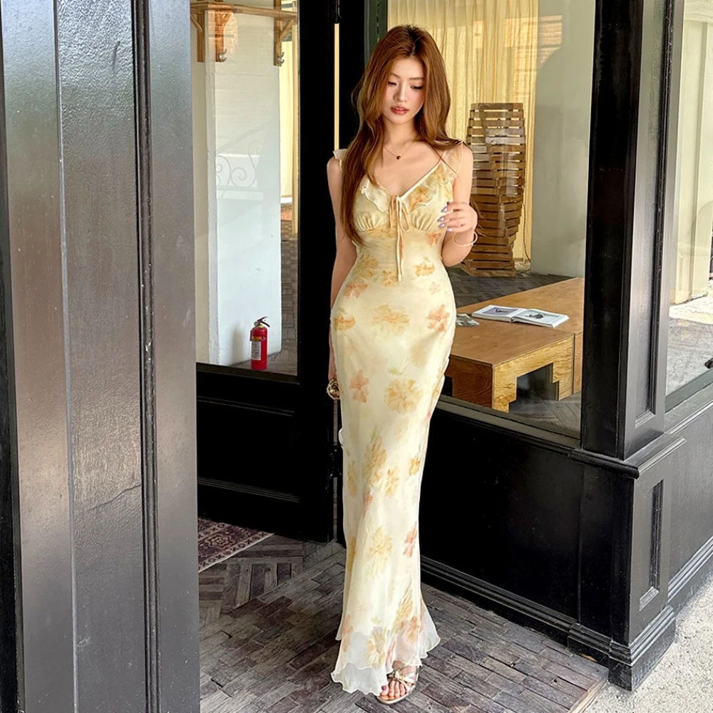 实拍2025春夏新款仲夏夜花园奶油黄印花花边v领连衣裙女修身长裙