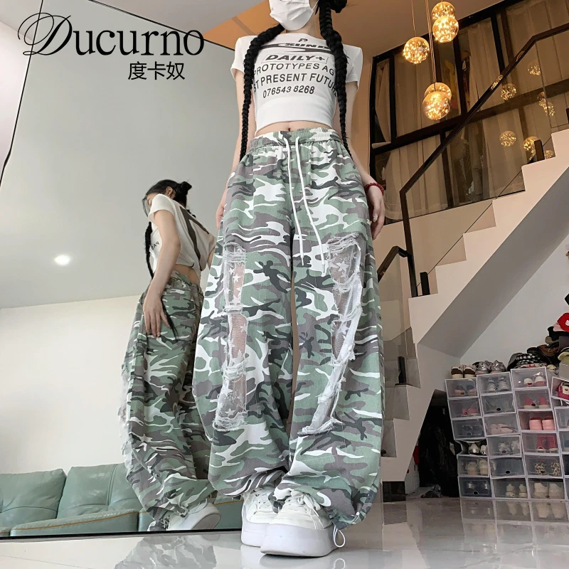 嘻哈街舞潮酷蕾丝破洞迷彩阔腿裤夏季街头爵士辣妹休闲弯刀香蕉裤