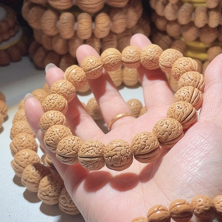 笑***雨吊坠桃核桃核手串玲珑塔48