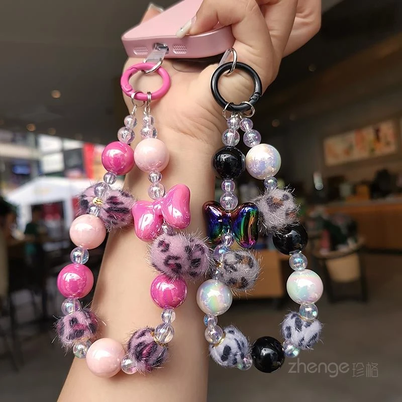 手机挂绳短款手腕时尚蝴蝶结豹纹毛球串珠挂饰轻奢手作夹片通用女