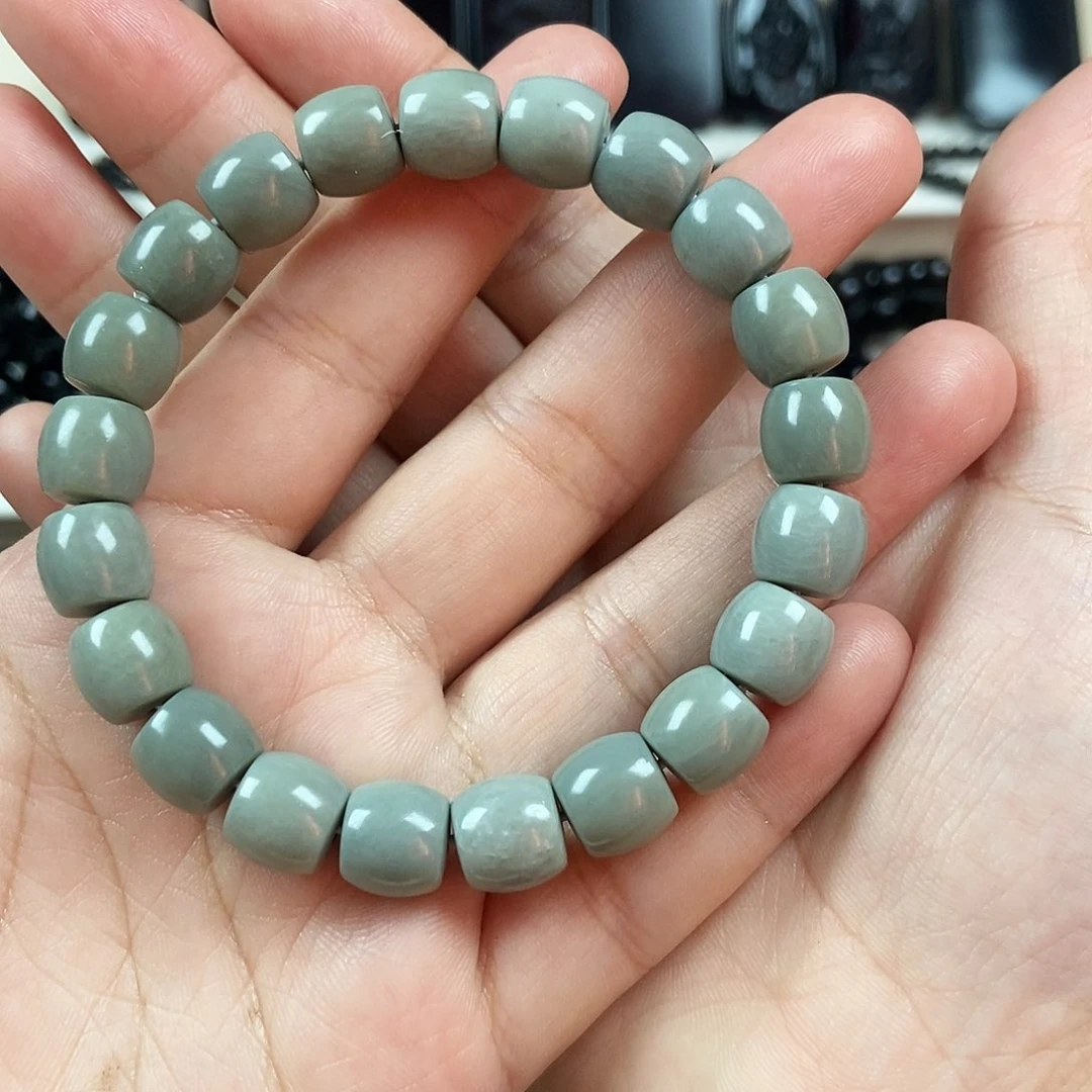 和田玉（青玉）卡10直切沙枣青手串极限孤未镶嵌