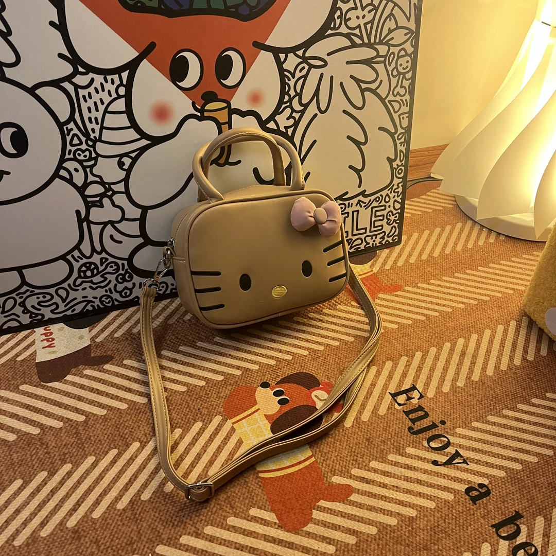 喵喵仙贝卡其色KT小手提斜挎-A318