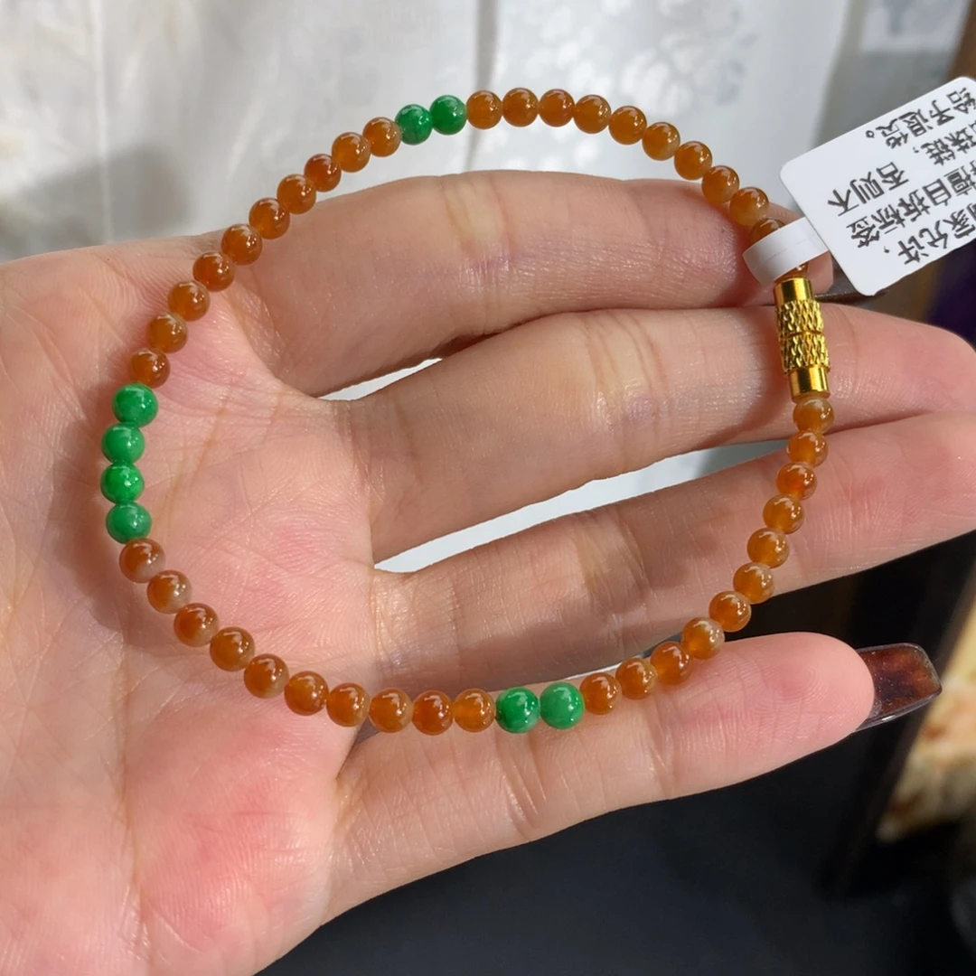 翡翠未镶嵌手串卡3.5胶润橘黄小米手串