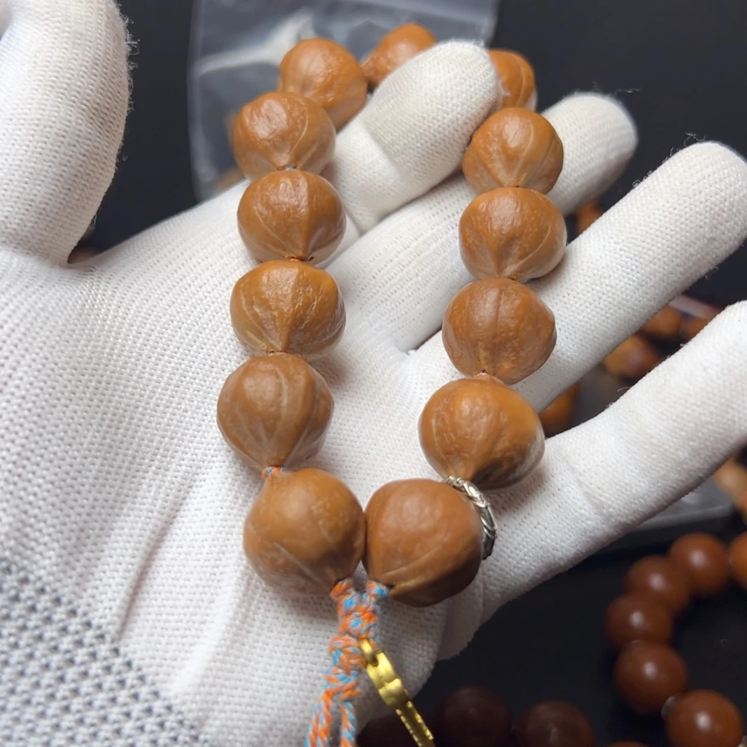 辉***呀橄榄核手串/手链1.8铁核2花素串