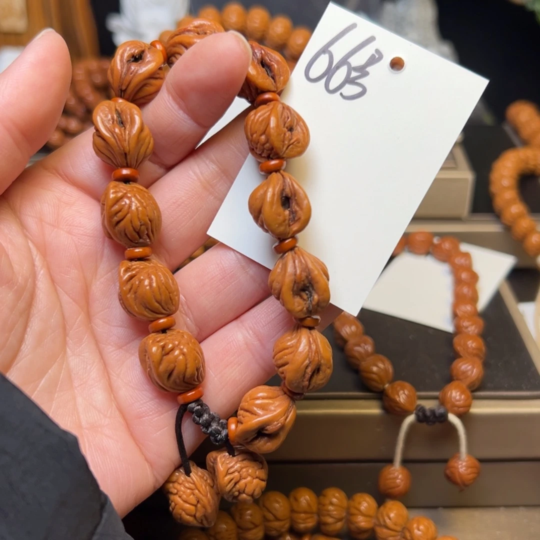 桃核吊坠秦岭龙纹桃核13生命之源