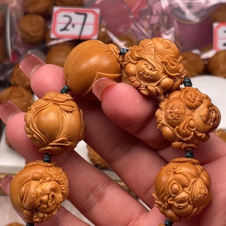 宇***都吊坠橄榄核橄榄核