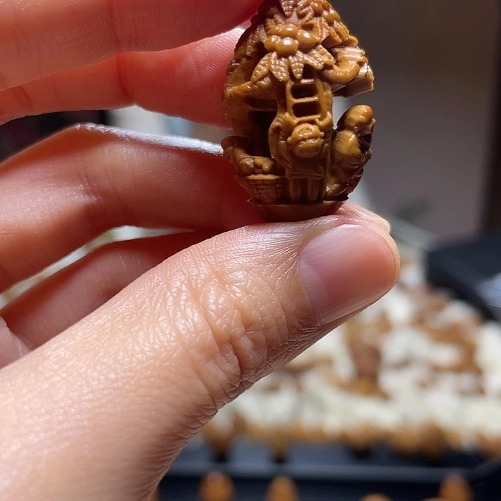 橄榄核吊坠五子登科