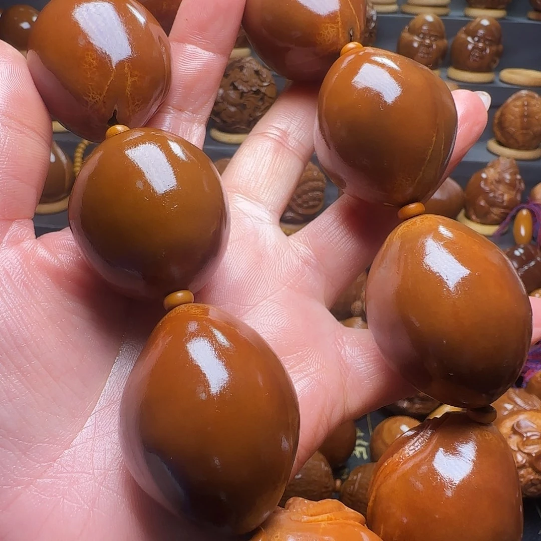 洪***樊橄榄核手串/手链单生手持