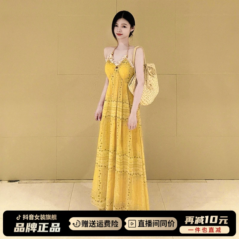 法式黄色海边度假连衣裙子2025新款今年流行爆款挂脖吊带长裙女夏