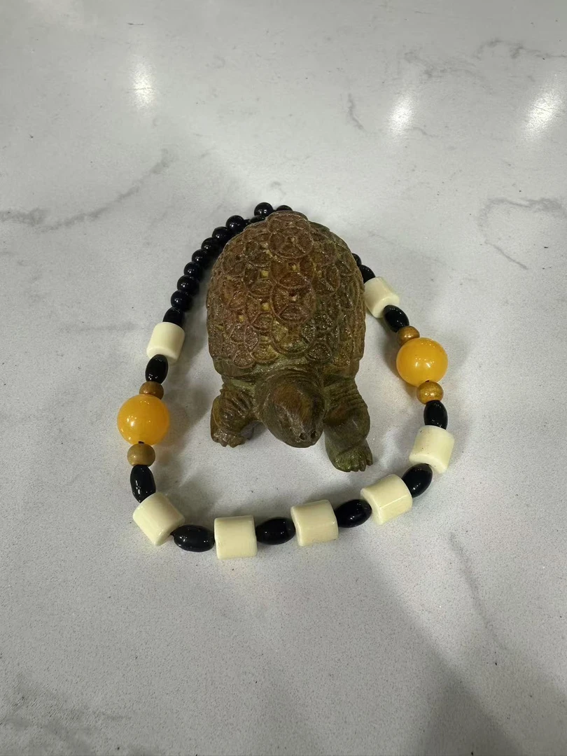 S7 绿檀金钱龟手把件