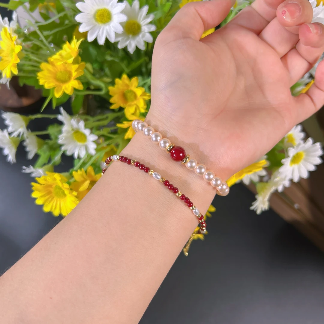 铜合金仿珍珠手链 铜合金原创安格拉红卡六橘粉手链轻奢