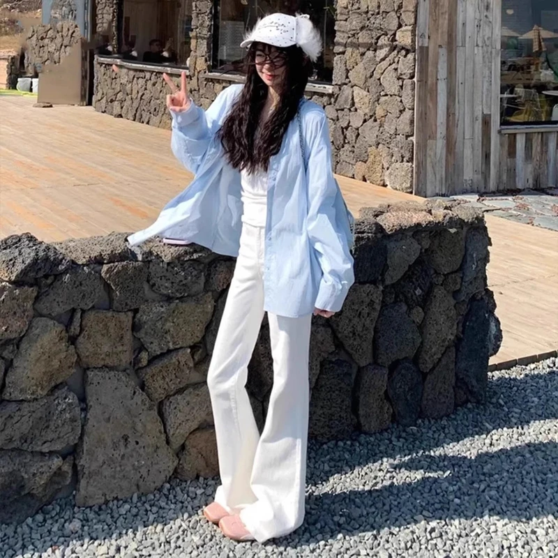 雪千羽白色bf风高腰微喇牛仔裤女2025春夏新款修身显瘦马蹄喇叭裤