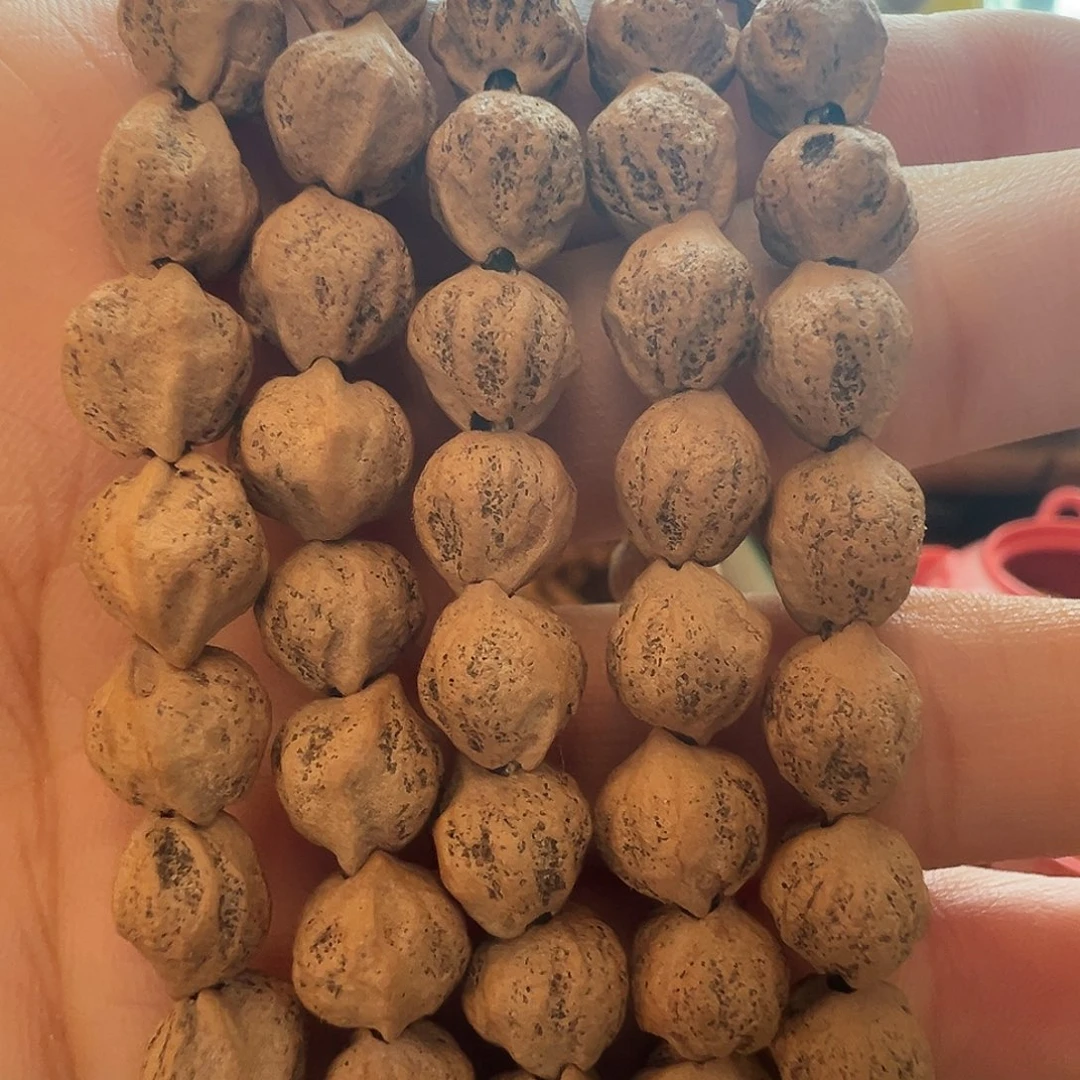 柏香籽/百香籽吊坠原装藏式鬼脸