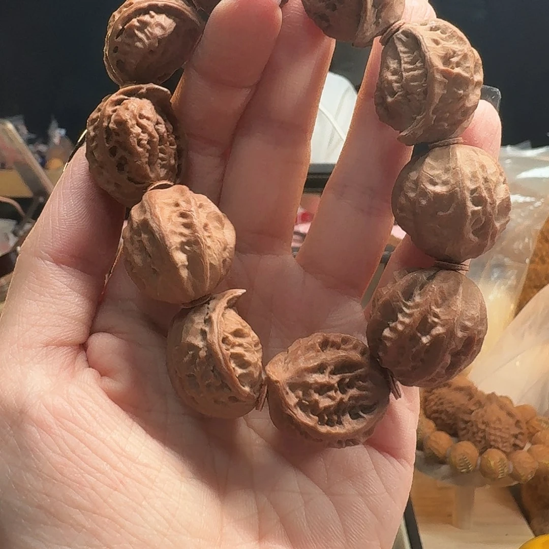 文玩核桃吊坠蛇头手串