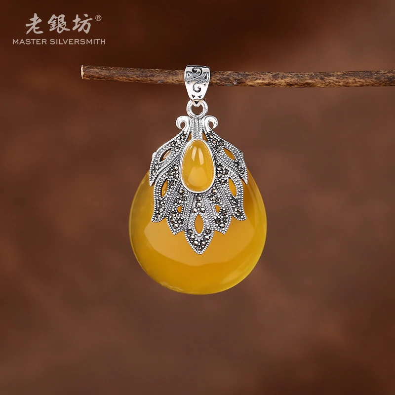 【老银坊】s925银马克赛羽毛黄玛瑙吊坠 00232297