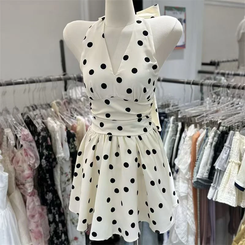 蝴蝶结绑带露背波点挂脖连衣裙夏新款甜辣收腰显瘦气质a字短裙子