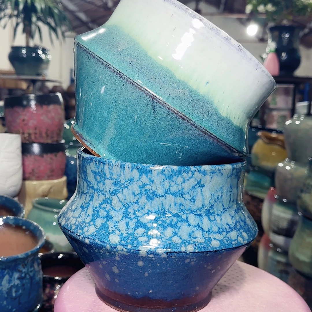 紫砂花盆高18口19。