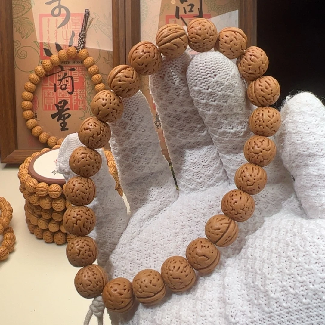 李***溪手串桃核1.3加「野丹」野生桃核手持