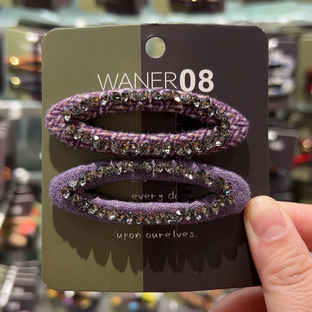 布艺非金属紫色钻拜拜夹