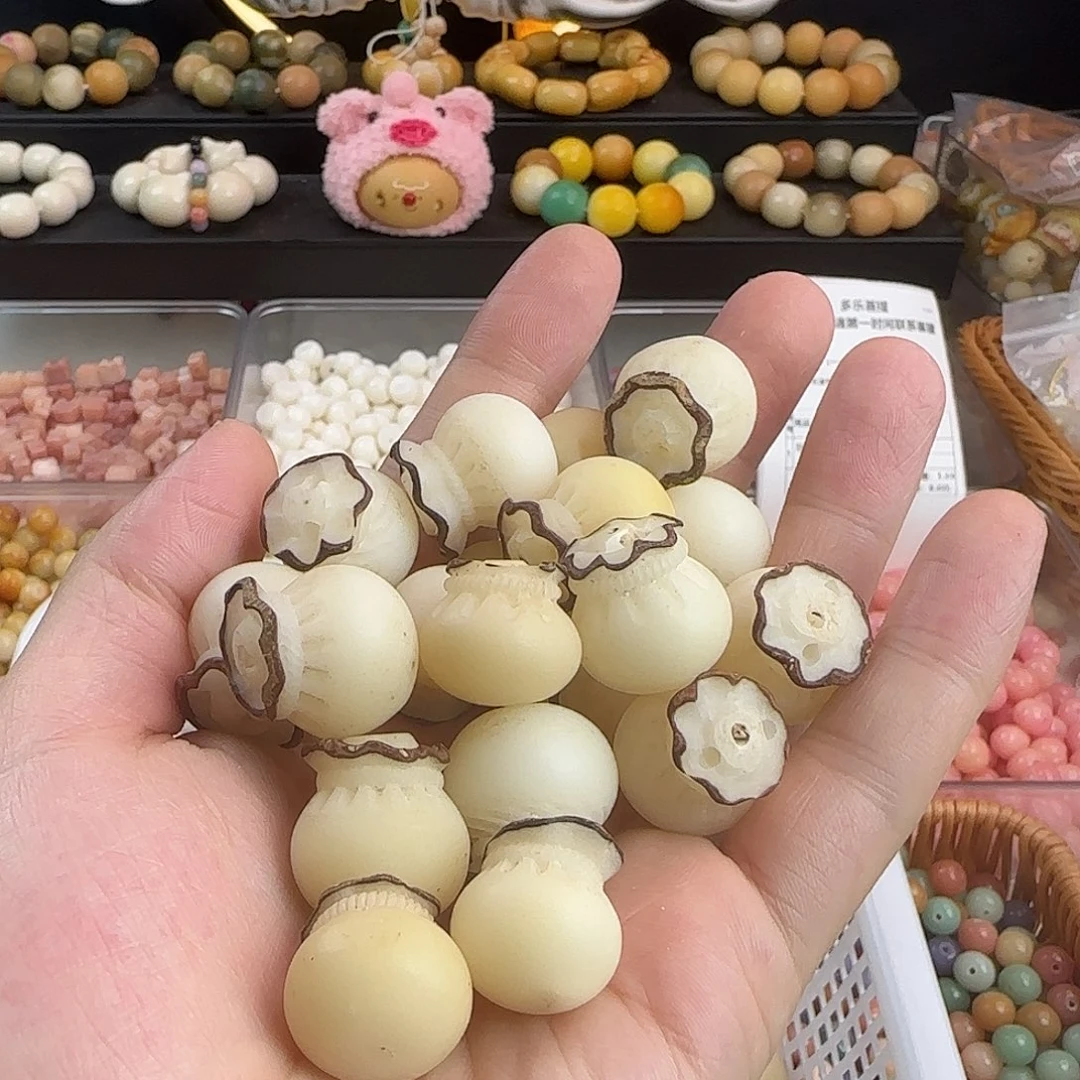 手串菩提根/象牙果瑕疵大钱袋10颗