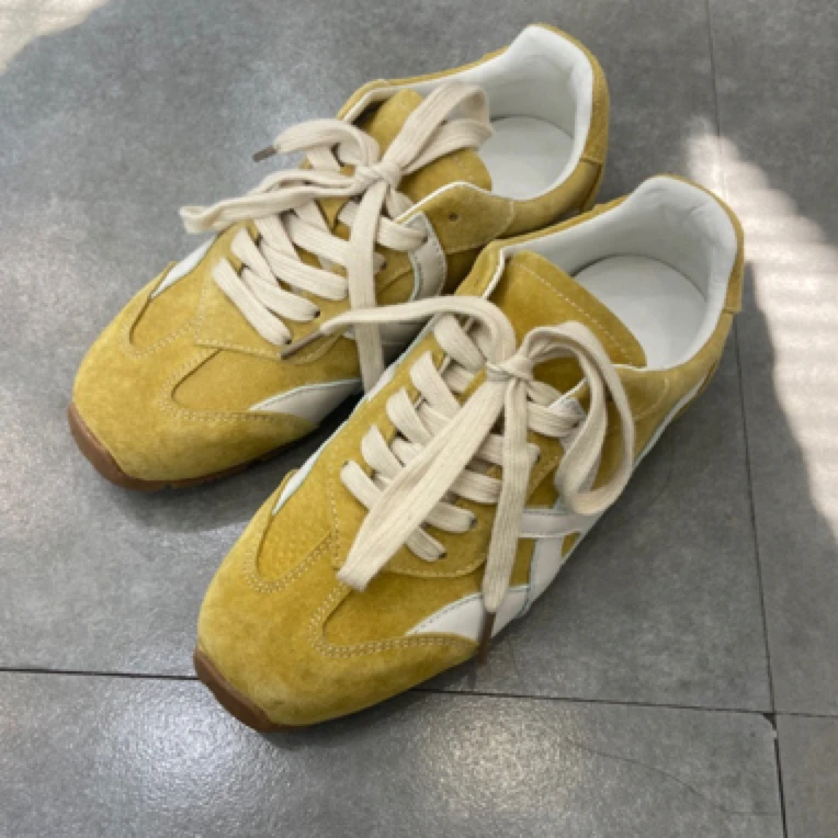 欧货柠檬黄撞色板鞋
