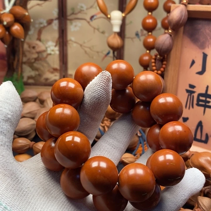 顺***铖橄榄核手串/手链2,1光珠反油