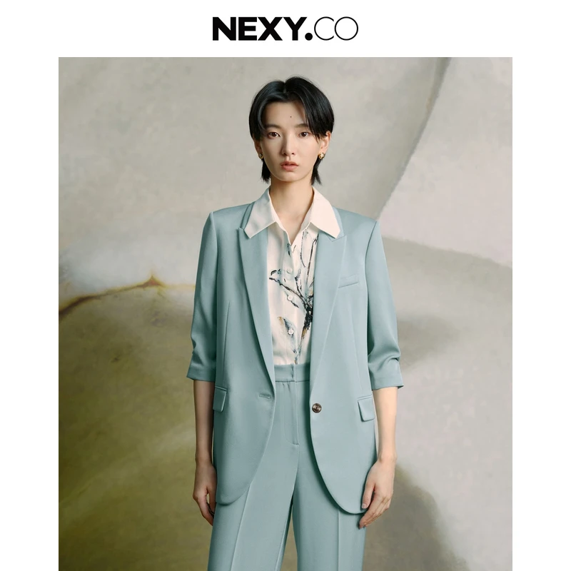 【晨粉专享价】NEXY.CO/奈蔻蓝色时尚绿色设计师职业通勤西装