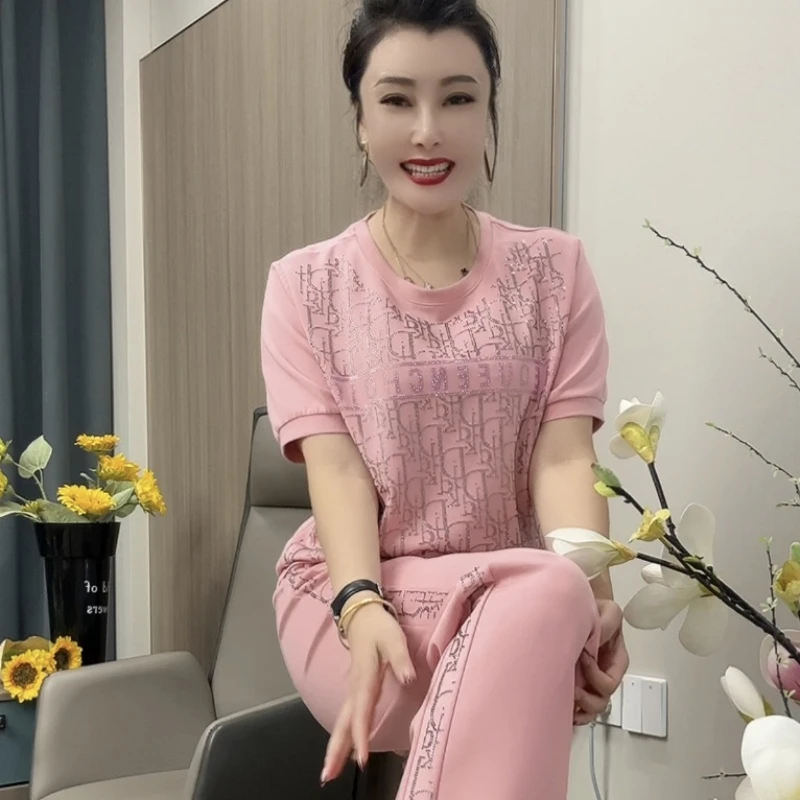 7877网红休闲运动套装阔腿中年洋气减龄时尚镂空百搭修身圆领