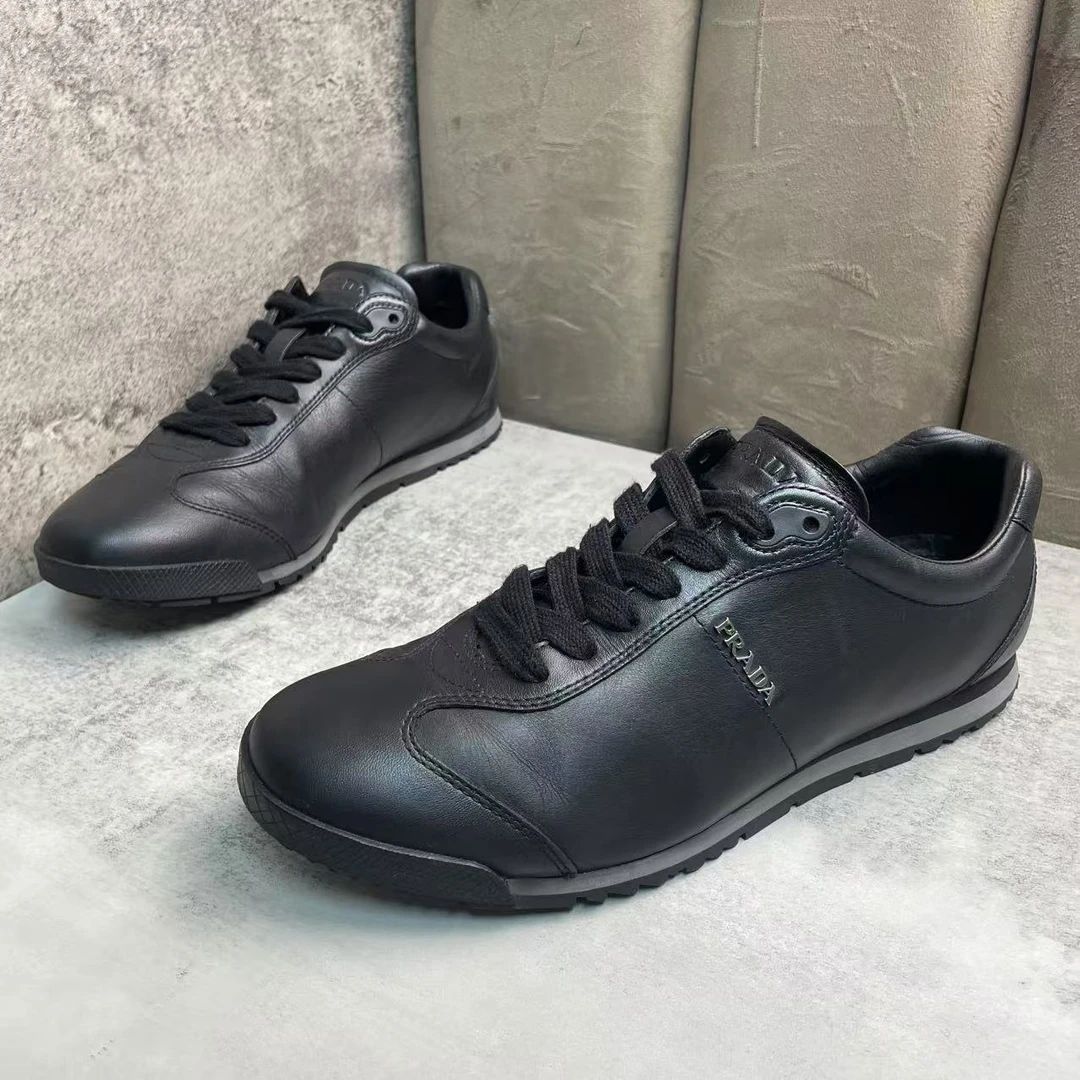 95新 Prada/普拉达 黑色皮革织带舒适百搭软底休闲运动鞋/40码