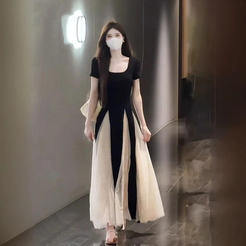 法式温柔风网纱拼接短袖连衣裙女2025夏季新款收腰大摆长裙礼服裙