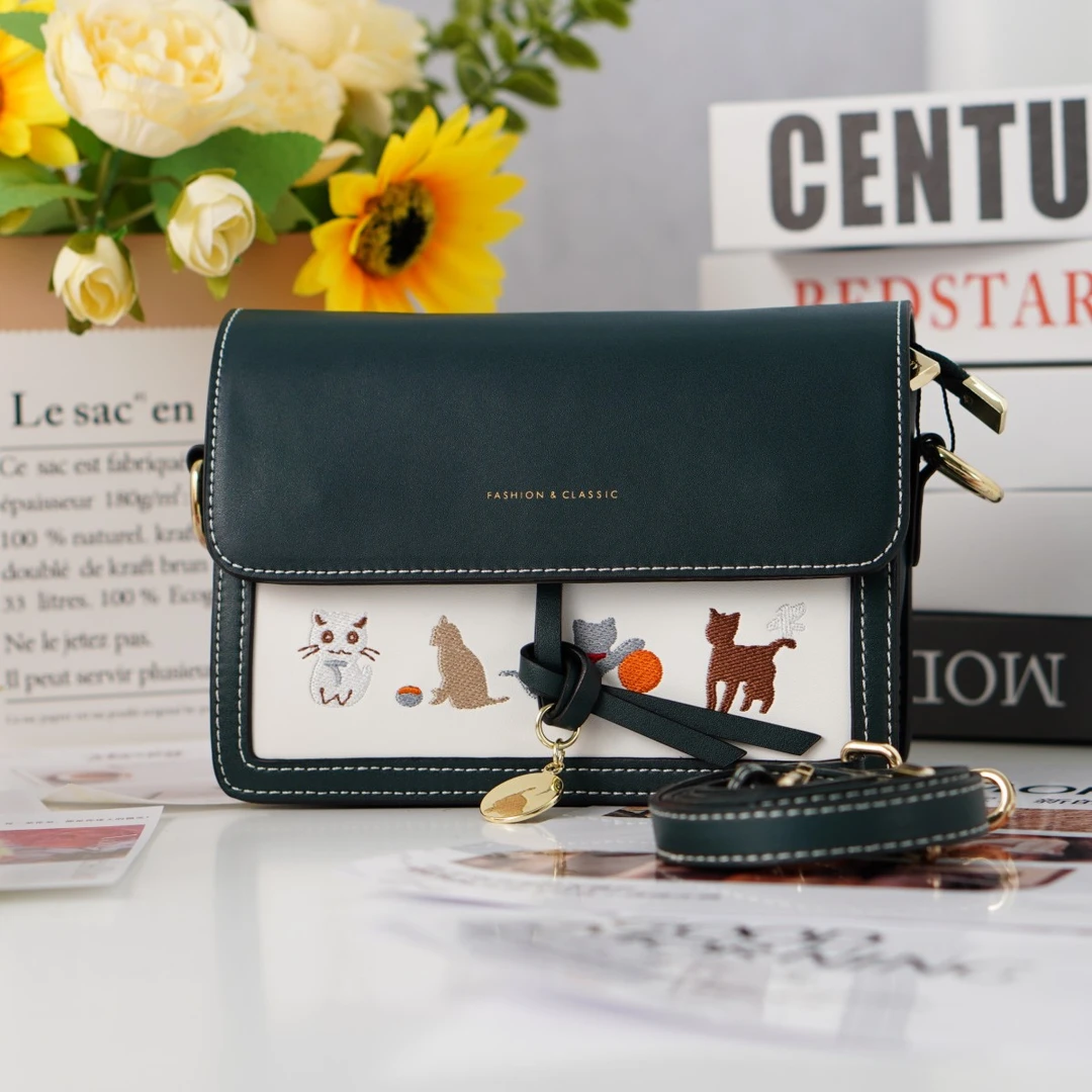 麦迪尚品【接WM】5051921 时尚简约卡通印花装饰单肩包品牌撤柜