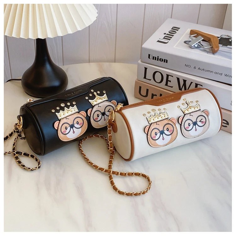 新赛道圆柱型情侣熊手拿包女士单肩斜挎包2024夏季新款女潮韩版包