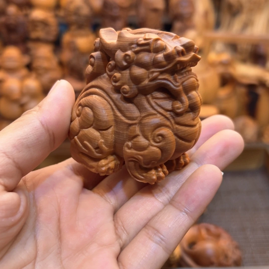 开***儿柏木（崖柏）貔貅手把件