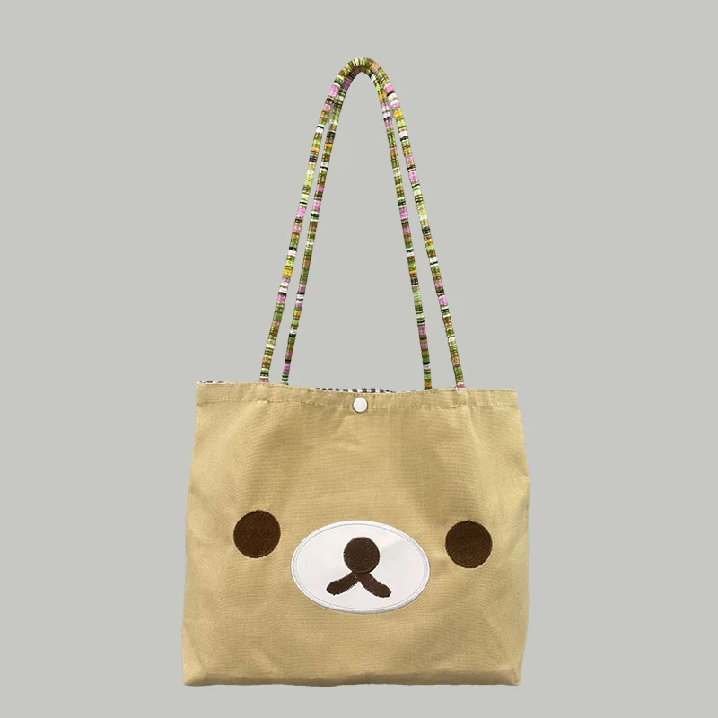 可爱轻松熊单肩包包女2025新款小众帆布通勤腋下包卡通手拎单肩包