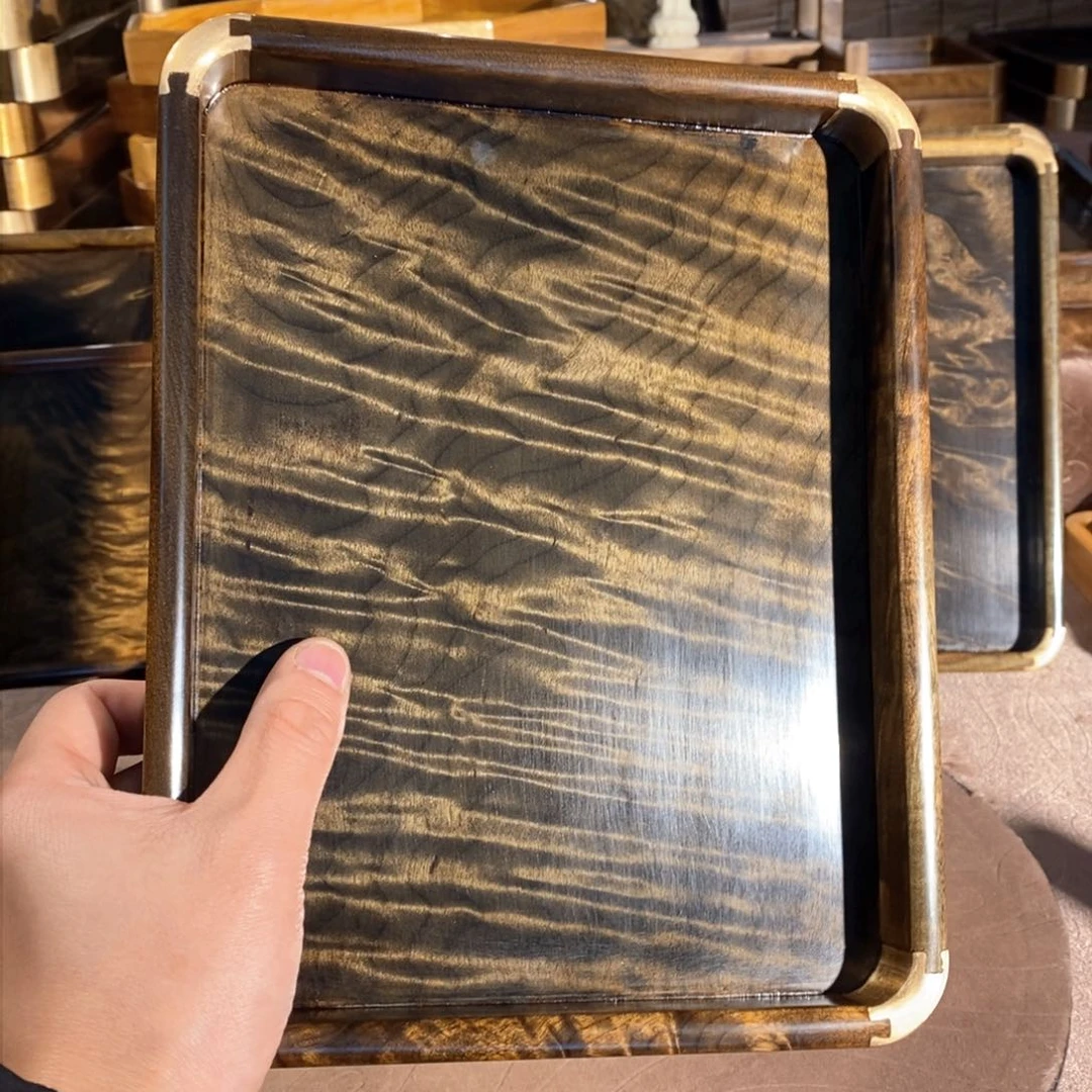 阴沉木雕金丝楠木文盘