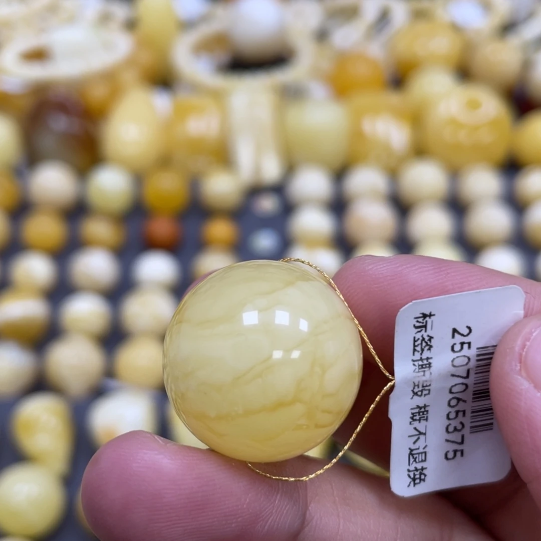 蜜蜡未镶嵌裸石21.4mm瑕