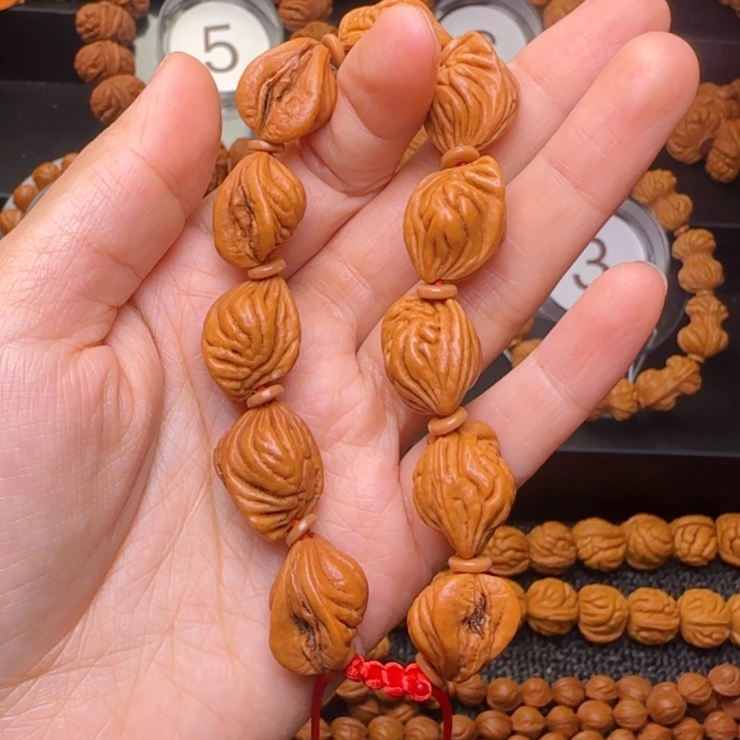 水***㵘桃核吊坠秦岭生命