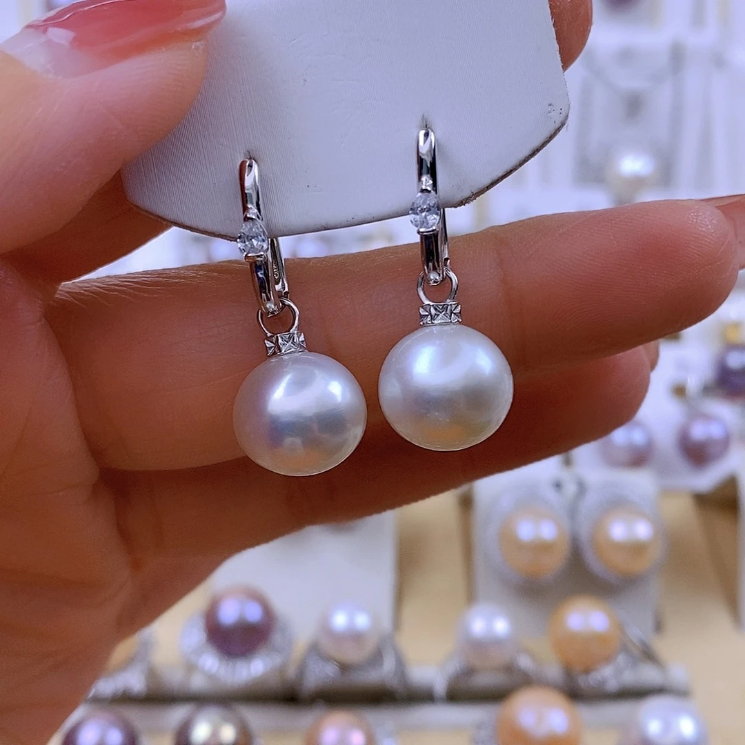 冬****淡水珍珠银S925镶嵌耳饰