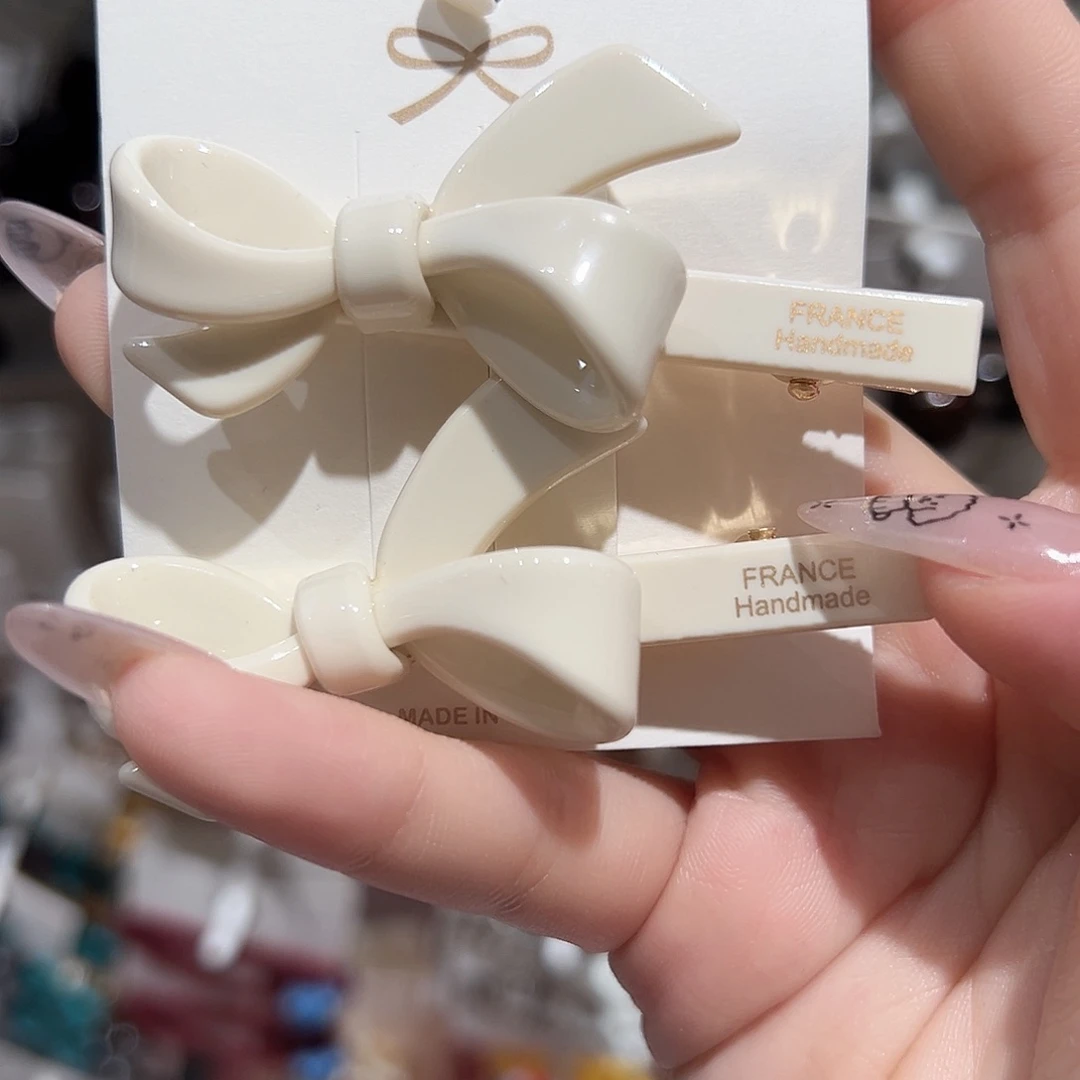 非金属仿珍珠白色蝴蝶结鸭夹