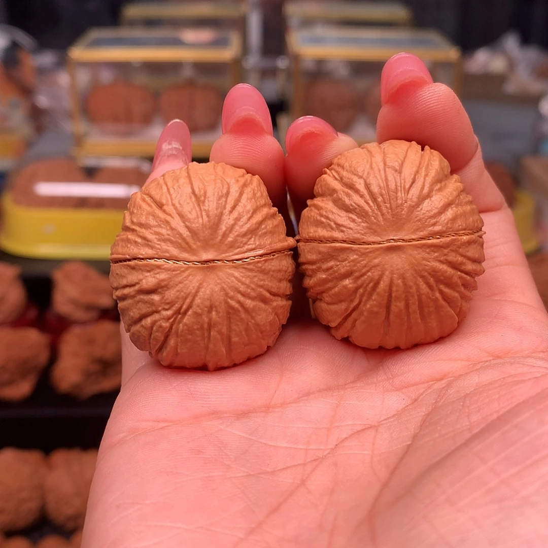 文玩核桃把件猴头元宝36