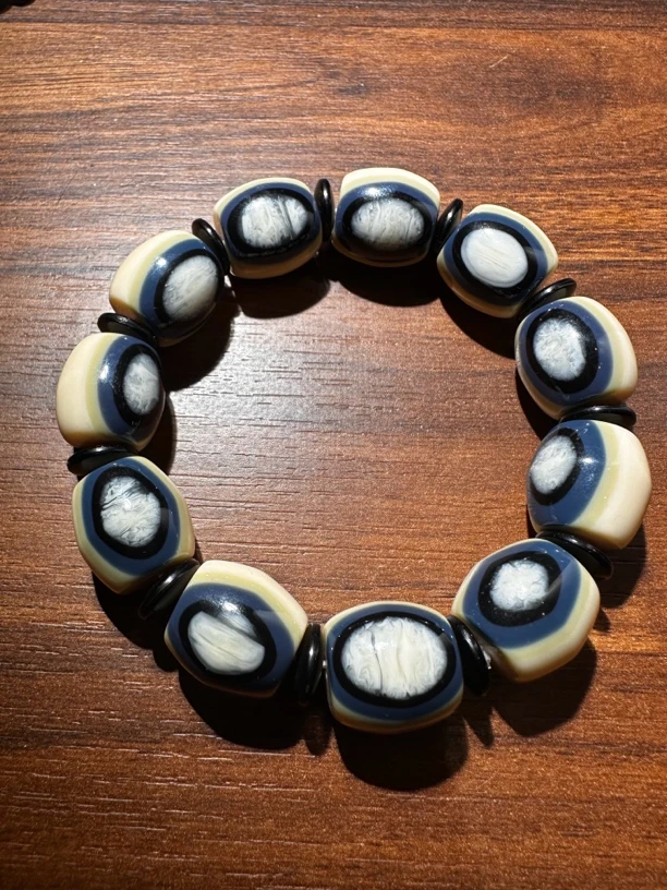 江江推荐-猛犸牙蓝眼手串MMY0012