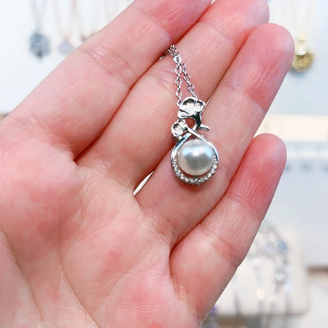 浪***子吊坠(赠链)淡水珍珠足银镶嵌
