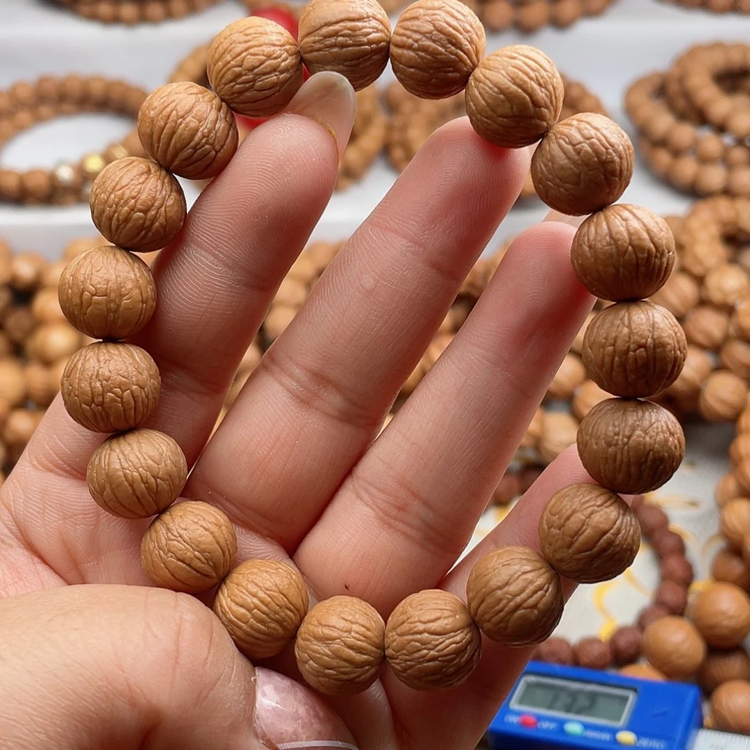 猴头核桃吊坠13+原装凤羽